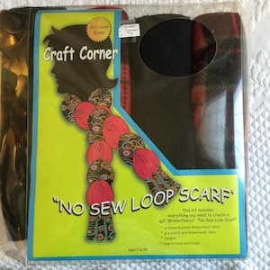 May include: A craft kit for making a "No Sew Loop Scarf" with colorful fabric. The kit includes everything needed to create a 60-inch scarf, including fabric, a template, and easy-to-follow instructions. The kit is designed for ages 7 to 99.