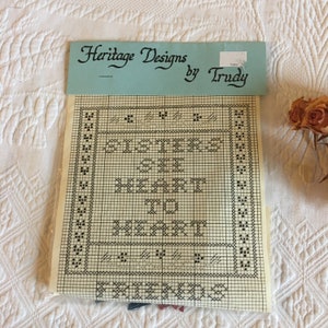 Counted Cross Stitch Heritage Designs by Trudy. 5" Square Design Says, Sisters See Heart to Heart, Or Friends See Heart to Heart.