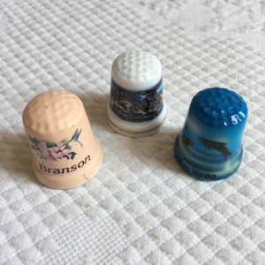 Vintage Porcelain San Diego Blue with Dolphins Thimble. Or Choose Porcelain Branson Peach Thimble with Flowers. Listing for One Thimble.