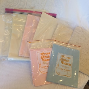 Choose Color of Aida Cloth for Counted Cross Stitch Projects. 18 Count Aida Cloth. 18&quot; X 18&quot; or 18&quot; X 30&quot; Aida in White to Oatmeal.