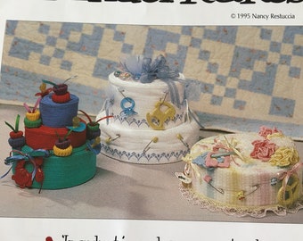 Kinder Kakes Diaper Cake Pattern and Instructions. Using Diapers, Pins, Towels, Receiving Blankets, Socks, Etc. Make a Baby Shower Cake.