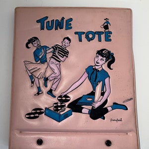 May include: A pink vinyl record carrying case with the words "Tune Tote" printed on the front. The case features illustrations of children listening to records and dancing.