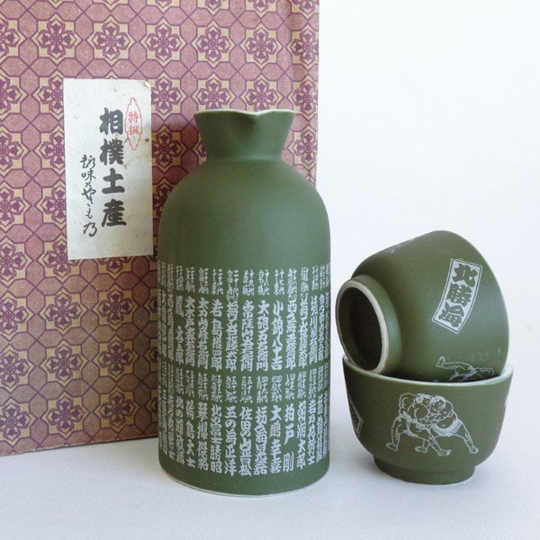 7521# Shuki Sake set Sumo motifs ,Vintage Japanese Ceramic Tokkuri bottle-flask & 2 Sake cup with carved Sumo wrestlers and poem ,Boxed