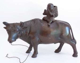 Boy playing a flute Ox-bull Japanese Cast Iron Sculpture Antique Handmade okimono, Showa era #8503