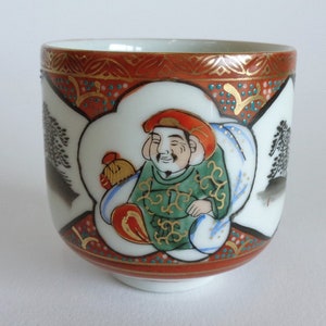Antique Kutani yaki Porcelain Tea cup  with Daikoku God and hand wrote calligraphy poem inside ,HAS SMALL CRACK #1888