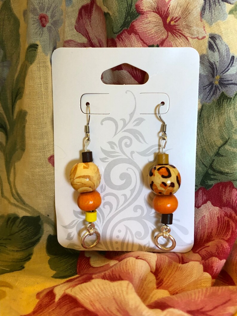 Spotted orange dangle earrings
