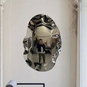 wall sculpture , convex mirror. convex mirror, chrome mirror, artwork , wall sculpture , metal sculpture, metal mirror, round