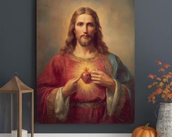 May include: A rectangular wall art print depicting a figure with long brown hair and a beard, wearing a red robe with gold trim and a blue mantle. The figure points to a glowing, thorn-crowned heart on the chest, set against a soft background.