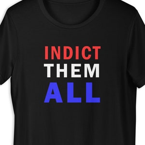 May include: Black t-shirt with the text "INDICT THEM ALL" in red, white, and blue.