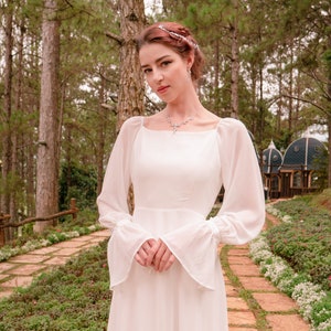 Silk Chiffon Wedding Dress: Long Train, Puffed Sleeves, Minimalist Design