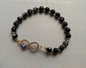 Black beaded bracelet infinity charm, evil eye bracelet, lucky gift, handmade gift for her