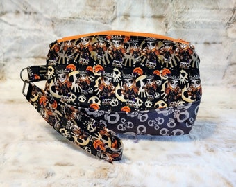 Handmade wristlet clutch with removal strap, horror themed custom fabric, voodoo priestess ladies, Ms Fits Fabric, Halloween purse, skull