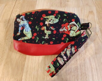Handmade wristlet clutch with removal strap, horror themed custom fabric, rockabilly zombie pin-up print, cherry old school, Halloween purse