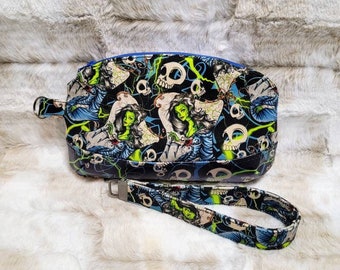 Handmade wristlet clutch with removal strap, horror themed custom fabric, bride of Frankenstein print