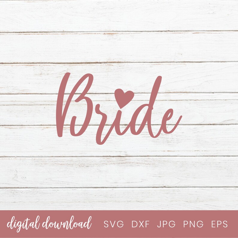 May include: A pink cursive word "Bride" with a small pink heart above the "i". The word is on a white wood background.