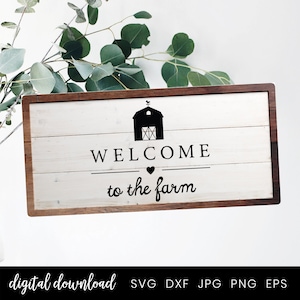Op de afbeelding: Een wit houten bord met een bruin frame, met een zwart silhouet van een schuur met een hart en de tekst "WELCOME to the farm".