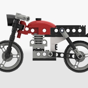 May include: A red, black, and gray toy motorcycle with a black headlight and a black seat. The motorcycle has a black frame and a gray engine.
