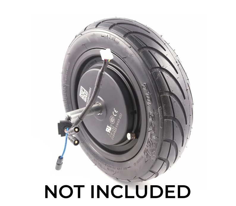 May include: Black electric scooter wheel with a tyre, motor, and wiring. The wheel has a black tyre with a tread pattern and a black motor with a silver axle. The wiring is black and blue and has a connector. The wheel is labelled "NOT INCLUDED".