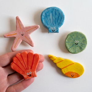 shell homemade magnets, ceramic clay fridge magnets, sea shell ornament, funny fridge magnets, save the dates magnet, fridge magnets