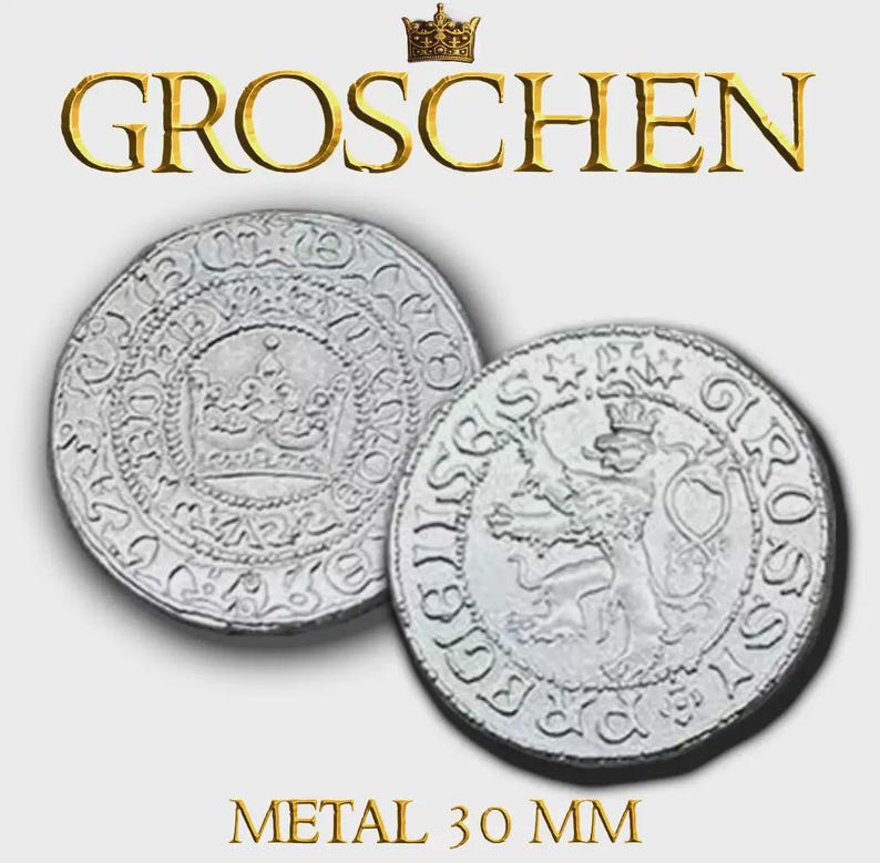K&ouml;nnte beinhalten: Zwei silberne M&uuml;nzen mit aufwendigen Designs. Eine M&uuml;nze zeigt eine Krone, die andere einen L&ouml;wen. Das Wort "GROSCHEN" steht &uuml;ber den M&uuml;nzen, darunter "METAL 30 MM". Die M&uuml;nzen haben einen Durchmesser von etwa 3 cm.