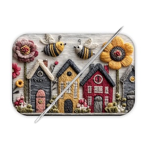 May include: Embroidered artwork featuring a row of colorful houses, flowers, and two bees. The houses are in shades of blue, yellow, and red, with detailed stitching. Flowers in red, yellow, and pink add to the whimsical scene.