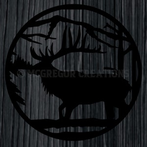 May include: Black silhouette of an elk with large antlers standing in a forest setting. The elk is in a circular frame with a wood grain background.