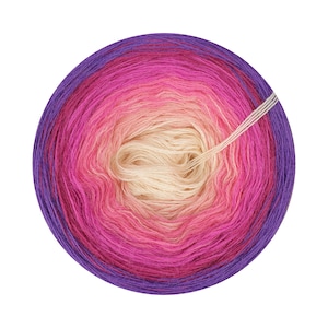 May include: A ball of yarn with a gradient of pink, purple, and white colors. The yarn is wound into a circle and the center is visible.