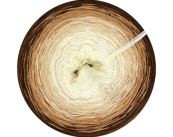 May include: A skein of ombre yarn in shades of brown, beige, and white. The yarn is wound into a ball shape and is ready to be used for knitting or crocheting.
