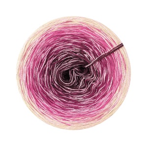 May include: A skein of yarn in a gradient of pink, white, and beige colors. The yarn is wound into a ball shape and is ready for knitting or crocheting.