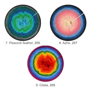 May include: Three skeins of yarn in different color combinations. The first skein is a gradient of teal, green, and gray. The second skein is a gradient of pink, cream, and blue. The third skein is a gradient of purple, red, orange, yellow, green, and blue. The skeins are labeled with numbers and names: 7. Peacock feather, 266, 8. Azha, 267, 9. Citala, 268.