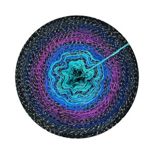 May include: A ball of yarn with a gradient of colors, starting with black and transitioning to teal, blue, purple, and then back to black. The yarn is wound in a spiral pattern, creating a circular shape.