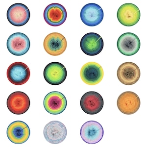 May include: A collection of nineteen circular yarn cakes arranged in a grid, each featuring a unique gradient colour pattern. The yarn cakes display various colour combinations including blues, pinks, greens, oranges, yellows, and neutral tones.