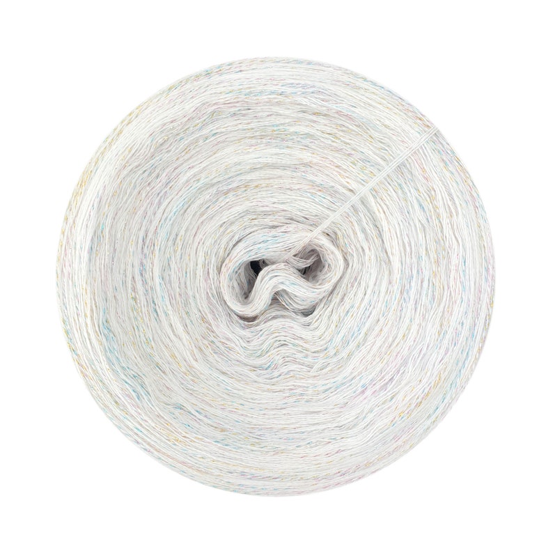 May include: A white ball of yarn with multicolored flecks. The yarn is wound into a tight coil.