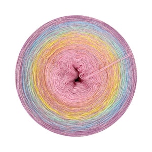 May include: A skein of rainbow ombre yarn with a pink center. The yarn has a subtle shimmer and is wound into a circular shape.