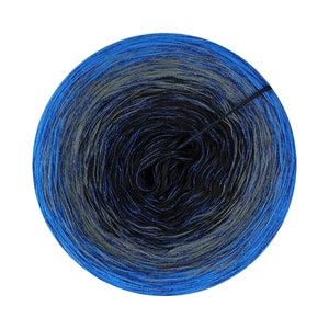 May include: A skein of blue, gray, and black yarn with a glittery finish. The yarn is wound into a ball shape.