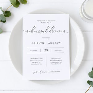 May include: A white rehearsal dinner invitation with black text. The invitation is for Kaitlyn and Andrew on Saturday, September 23rd. It includes the time and location for the rehearsal and dinner.