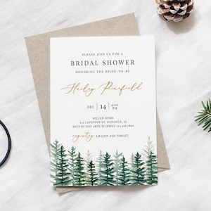 May include: Bridal shower invitation with a forest design. The invitation features the text "Please join us for a bridal shower honoring the bride-to-be" and the name "Haily Pinefield" in gold script. The date and time are also included.