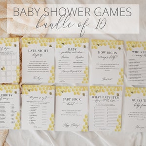 May include: A set of ten printable baby shower games featuring a bee and honeycomb theme. The games include "Baby Bingo", "Late Night Diapers", "Baby Predictions", "How Big is Mommy's Belly", "Who Knows Mommy Best", "Celebrity Baby Names", "The Price is Right", "Baby Sock Hunt", "What Baby Item Begins with this Letter", and "Guess the Baby Food".