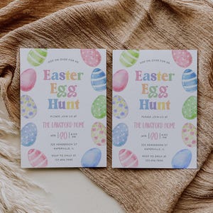 May include: Two Easter Egg Hunt invitations with colorful watercolor eggs. The invitations include the text "Easter Egg Hunt" and event details: date, time, location, and RSVP information.