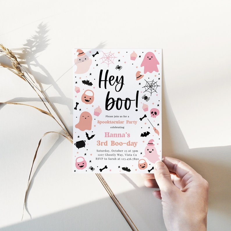 May include: A pink and black Halloween party invitation with a ghost, bats, and a spider web. The text reads "Hey boo!" and "Hanna's 3rd Boo-day".
