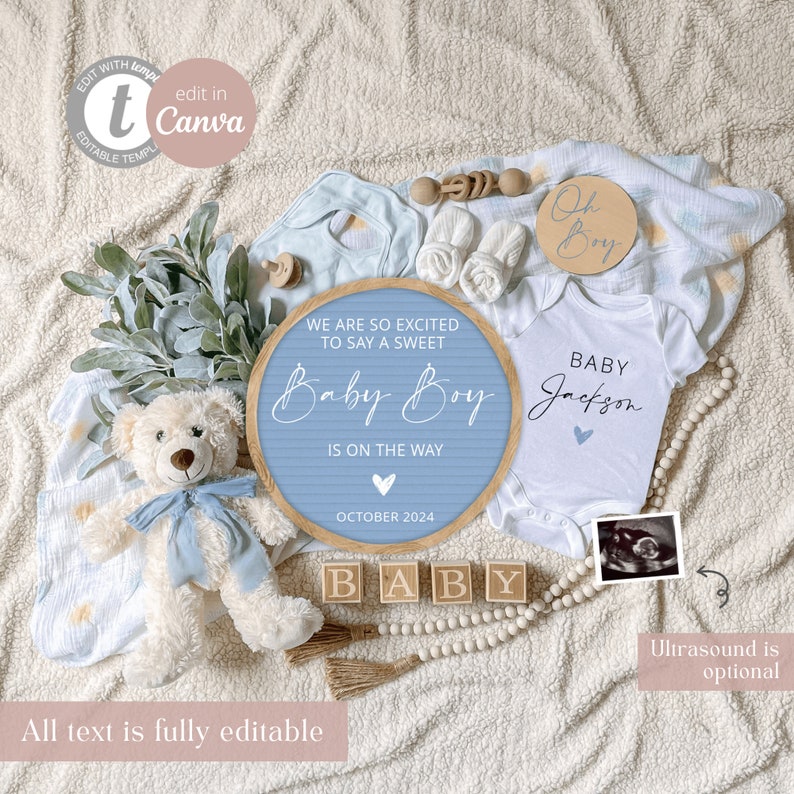 May include: A blue and white baby announcement sign with the text "We are so excited to say a sweet Baby Boy is on the way" and "October 2024". The sign is surrounded by baby items, including a teddy bear, a onesie, and wooden blocks spelling out "BABY".