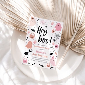 May include: Pink and black Halloween party invitation with a ghost, bats, and a spider web. The text reads "Hey boo!" and "Please join us for a Spooktacular Party celebrating Hanna's 3rd Boo-day".
