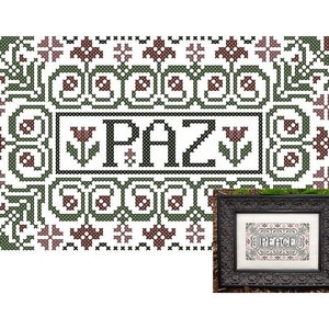 Puede incluir: Patrón de punto de cruz con un borde floral y la palabra "PAZ" en el centro. El patrón es en negro, verde y marrón.