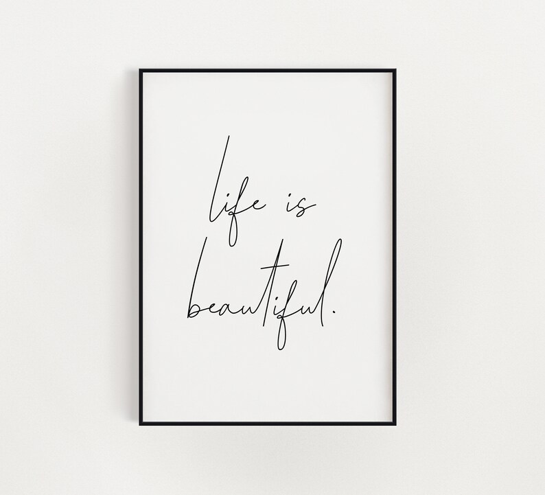 May include: Black and white printable wall art with the text "life is beautiful" written in cursive.
