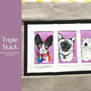 May include: A quilt block featuring three framed images of cats. The cats are a black and white cat wearing a colourful scarf, a Siamese cat with blue eyes, and a white cat with black markings. The quilt block is made with a light grey fabric and has a black border.