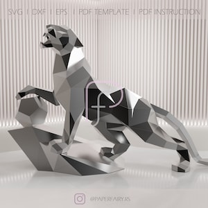 May include: A silver, geometric, papercraft model of a panther, standing on a rock. The model is made of many small, triangular pieces of paper, which are folded and glued together to create a 3D effect. The panther is posed in a dynamic, leaping position, with its head turned to the side and its claws extended. The model is a great example of the intricate and detailed work that can be achieved with papercraft.