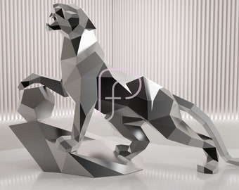 May include: A silver, geometric, papercraft model of a panther, standing on a rock. The model is made of many small, triangular pieces of paper, which are folded and glued together to create a 3D effect. The panther is posed in a dynamic, leaping position, with its head turned to the side and its claws extended. The model is a great example of the intricate and detailed work that can be achieved with papercraft.