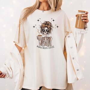 Coffee Skeleton Unisex T-shirt, Mama Needs Coffee Tee, Funny Halloween Shirt, Gift for Coffee Lover, Graphic Tee, Skeleton Coffee Cup Shirt