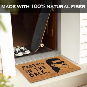 May include: A brown doormat with the text "Party's in the back." and a cartoon image of a person with a mustache and sunglasses.