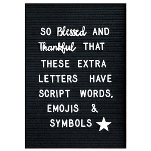 May include: A black felt letter board with white letters spelling "SO Blessed AND Thankful THAT THESE EXTRA LETTERS HAVE SCRIPT WORDS, EMOJIS & SYMBOLS" with a white star.